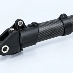 Close view of the folding-end fitting and pivot opening on a carbon-fibre drone arm