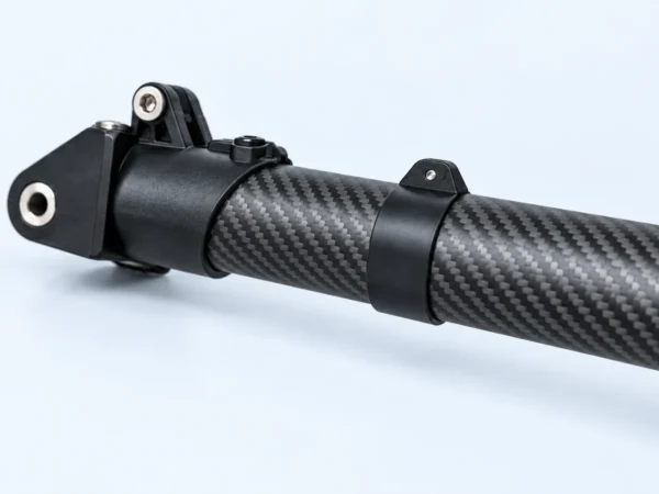 Detailed angled view of the folding joint and carbon-fibre tube on a drone arm reference